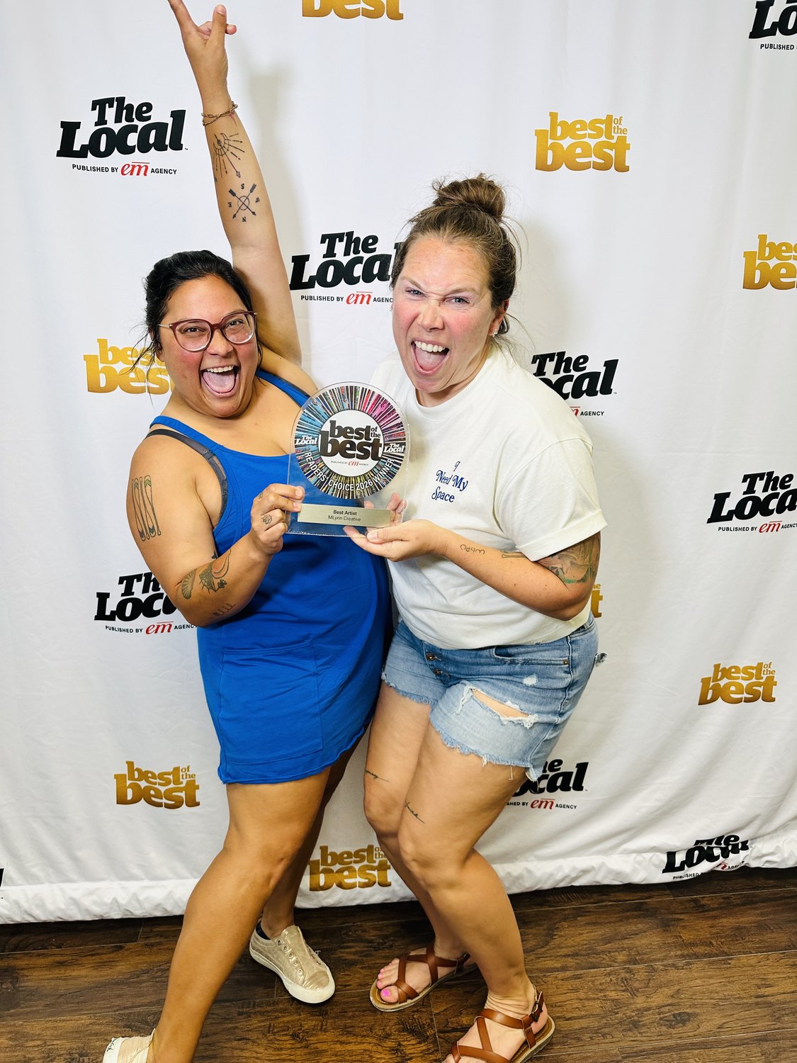 Jess and Christina of M. Lynn Creative accepting the Best Artist award at The Local's Best of the Best 2026